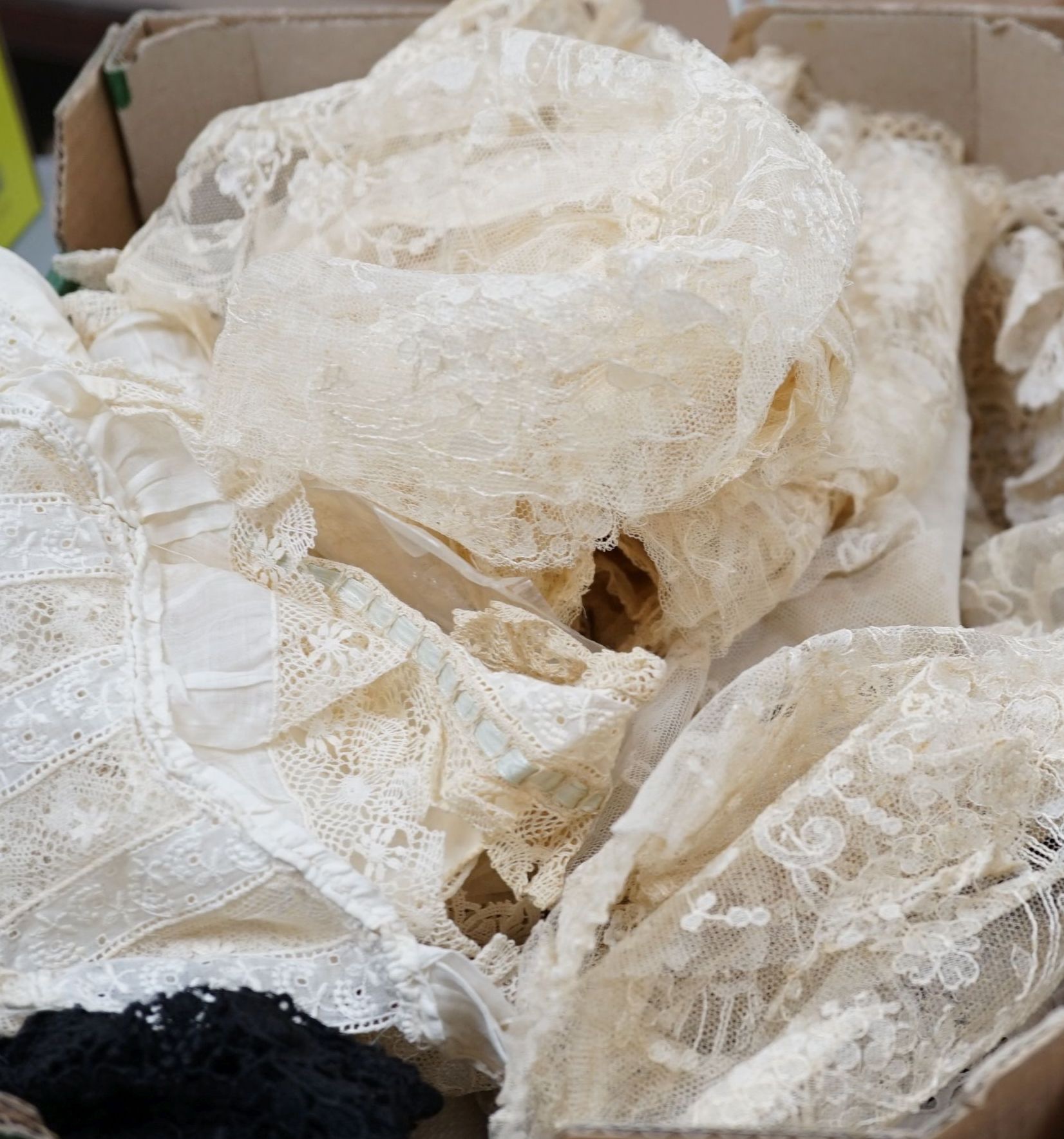 A lace bolero, a small collection of lace collars, trimmings etc